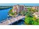 Luxury waterfront community with a private bridge and beautiful landscaping at 1904 Monte Carlo Dr, Sarasota, FL 34231