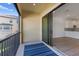 Screened balcony with sliding glass doors and outdoor rug at 1904 Monte Carlo Dr, Sarasota, FL 34231
