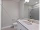 Bathroom with single vanity, toilet and shower at 1904 Monte Carlo Dr, Sarasota, FL 34231
