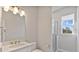 Clean bathroom, walk-in shower, updated vanity at 1904 Monte Carlo Dr, Sarasota, FL 34231