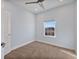 Bedroom with light blue walls and carpeted floor at 1904 Monte Carlo Dr, Sarasota, FL 34231