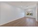 Spacious bedroom with light walls and wood floors at 1904 Monte Carlo Dr, Sarasota, FL 34231