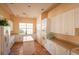 Community kitchen with white cabinets and an island at 1904 Monte Carlo Dr, Sarasota, FL 34231