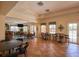 Community room with tables, chairs, and a large TV at 1904 Monte Carlo Dr, Sarasota, FL 34231