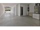 Attached garage with epoxy flooring and storage space at 1904 Monte Carlo Dr, Sarasota, FL 34231
