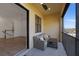 Relaxing screened balcony with seating area, offering partial water view at 1904 Monte Carlo Dr, Sarasota, FL 34231
