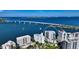 Aerial view showing the location of the condo building on the waterfront at 280 Golden Gate Pt # 700, Sarasota, FL 34236