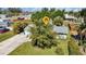 Single-Gathering home with a large yard, surrounded by lush greenery at 312 San Marie Dr, Punta Gorda, FL 33950