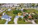 House in a residential neighborhood with surrounding houses and vegetation at 312 San Marie Dr, Punta Gorda, FL 33950