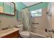Clean bathroom with shower/tub combo and updated vanity at 312 San Marie Dr, Punta Gorda, FL 33950