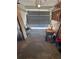 Garage with open door, showing workshop and storage at 312 San Marie Dr, Punta Gorda, FL 33950