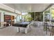 Screened lanai with pool table and storage at 312 San Marie Dr, Punta Gorda, FL 33950