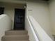 Condo building entrance with steps leading to unit 4546 at 4546 Longwater # 44, Sarasota, FL 34235