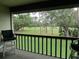 Balcony view overlooking a lush green golf course at 4546 Longwater # 44, Sarasota, FL 34235