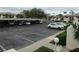 Covered parking lot with ample spaces for residents at 4546 Longwater # 44, Sarasota, FL 34235