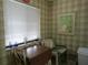 Kitchen nook with wood table and chairs, perfect for casual dining at 4546 Longwater # 44, Sarasota, FL 34235