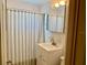 Clean and well-maintained bathroom with shower and vanity at 475 Benjamin Franklin Dr # 209, Sarasota, FL 34236
