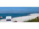 Scenic beach view, showcasing pristine sands and clear waters at 475 Benjamin Franklin Dr # 209, Sarasota, FL 34236