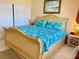 Spacious Primary bedroom with large bed and ample closet space at 475 Benjamin Franklin Dr # 209, Sarasota, FL 34236