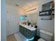 Modern bathroom with a double vanity and stylish finishes at 5211 Moon Shell Dr, Apollo Beach, FL 33572