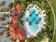 Aerial view of community pool and playground at 5732 Tripoli Dr, Palmetto, FL 34221