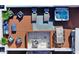 Aerial view of a rooftop terrace with hot tub and lounge furniture at 62 Audubon Pl, Sarasota, FL 34237