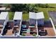 Aerial view of multiple units with private rooftop terraces and hot tubs at 62 Audubon Pl, Sarasota, FL 34237