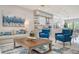 Open living space with kitchen and comfortable seating at 62 Audubon Pl, Sarasota, FL 34237