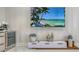 Stylish media room with large TV and built-in wine cooler at 62 Audubon Pl, Sarasota, FL 34237