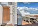Private rooftop deck with elevator access, outdoor kitchen, and dining area at 62 Audubon Pl, Sarasota, FL 34237