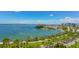 Stunning waterfront view with boats, bridge, and cityscape in the background at 62 Audubon Pl, Sarasota, FL 34237