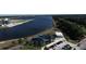 Aerial view of park, lake, and parking lot at 6828 Coyote Ridge Ct, University Park, FL 34201