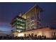 Modern building with open-air architecture at night at 6828 Coyote Ridge Ct, University Park, FL 34201