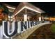 University Town Center entrance with water features at night at 6828 Coyote Ridge Ct, University Park, FL 34201