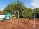 playground with swings and climbing equipment at 6828 Coyote Ridge Ct, University Park, FL 34201