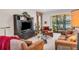 Spacious living room with lake view and comfortable seating at 8231 Stirling Falls Cir, Sarasota, FL 34243