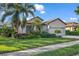 Beautiful house exterior with well-maintained landscaping at 8231 Stirling Falls Cir, Sarasota, FL 34243