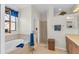 Bathroom with soaking tub, double vanity, and walk-in shower at 8231 Stirling Falls Cir, Sarasota, FL 34243