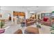 Open living room and kitchen area with comfortable furnishings at 8231 Stirling Falls Cir, Sarasota, FL 34243