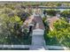 Aerial view of house, showcasing its location near the water at 8231 Stirling Falls Cir, Sarasota, FL 34243