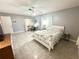 Spacious bedroom featuring a comfortable bed and ample floor space at 108 Shell Rd, Venice, FL 34293