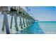 Inviting pier view with the clear aqua ocean water visible from the coastline at 108 Shell Rd, Venice, FL 34293