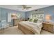 Large main bedroom with a king-size bed and lots of natural light at 115 Villa Dr # 115, Osprey, FL 34229