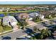 Aerial view of the neighborhood with a pond at 12432 Golden Sage Dr, Sarasota, FL 34238