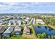 Aerial view of community with houses and ponds at 12926 True Blue Cir, Bradenton, FL 34211