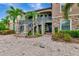 Two-story building exterior with stone and stucco at 13711 Messina Loop # 102, Bradenton, FL 34211