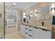 Elegant bathroom with double vanity and granite countertop at 177 N Waterway Nw Dr, Port Charlotte, FL 33952