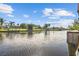 Scenic view of a canal with waterfront homes and lush landscaping at 177 N Waterway Nw Dr, Port Charlotte, FL 33952