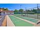 Community shuffleboard courts with green surface at 1801 Gulf N Dr # 222, Bradenton Beach, FL 34217