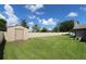 Large backyard with shed and privacy fence at 1820 E Leewynn Dr, Sarasota, FL 34240